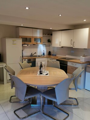 Comfort Apartment | Private kitchen | Full-size fridge, microwave, oven, stovetop - Comfortable mountain view apartment near Lucerne (Ruswil)