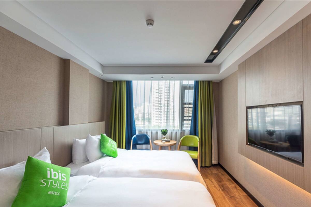 Twin Room | Blackout drapes, iron/ironing board, free WiFi, bed sheets