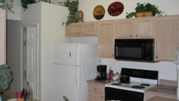 Villa | Private kitchen | Fridge, oven, stovetop