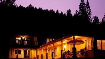 House (welcomes up to 29 guests) | Front of property – evening/night