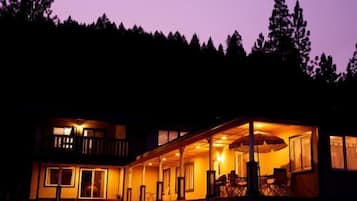 House (welcomes up to 29 guests) | Front of property - evening/night