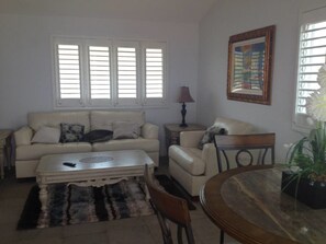 House | Living room | TV - Loft on the Pacific Holiday home 1 BestStayz.1 (Petacalco)
