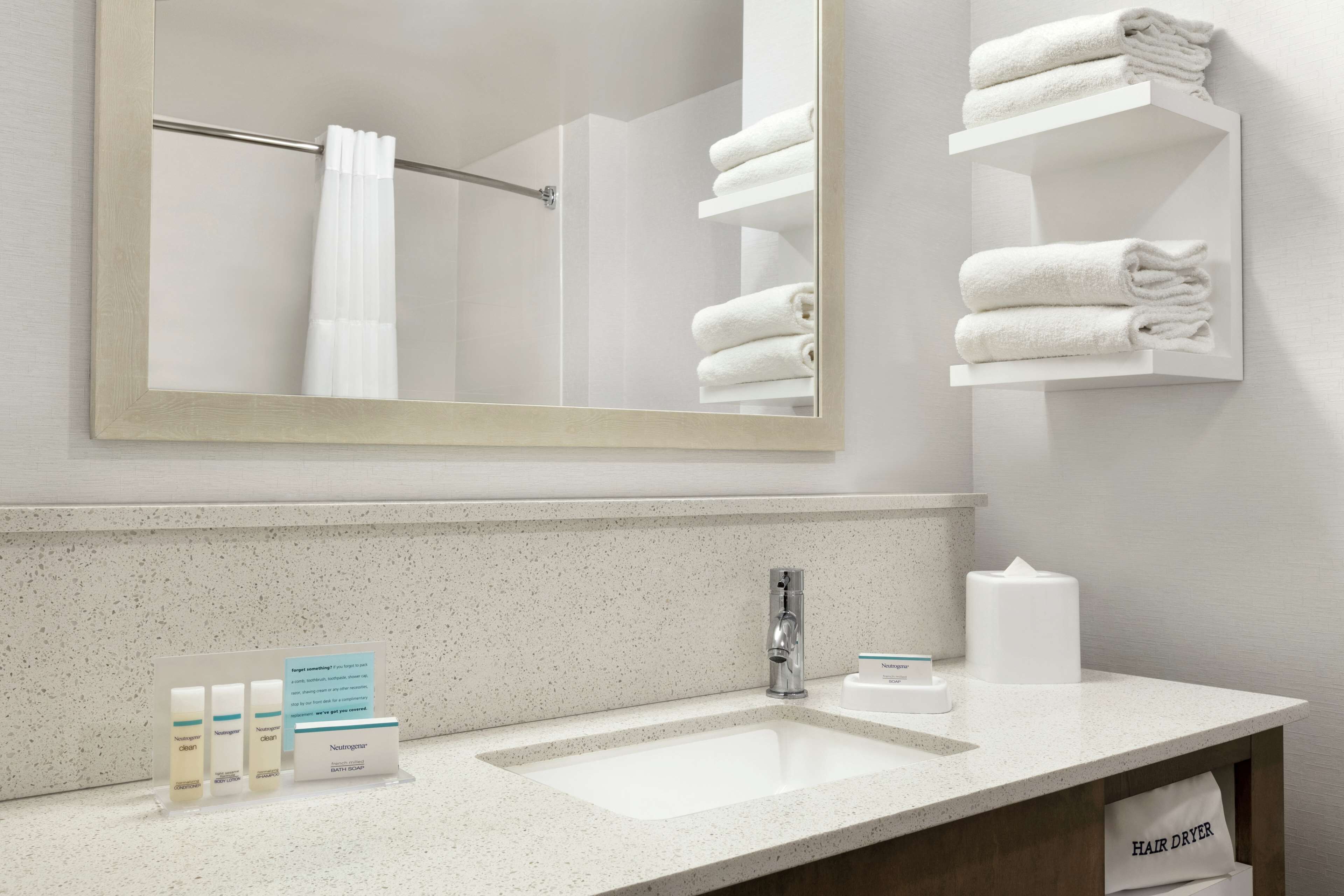 combined shower/bathtub, free toiletries, hair dryer, towels