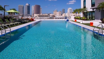 Outdoor pool, pool umbrellas, sun loungers