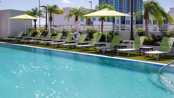 Outdoor pool, pool umbrellas, sun loungers