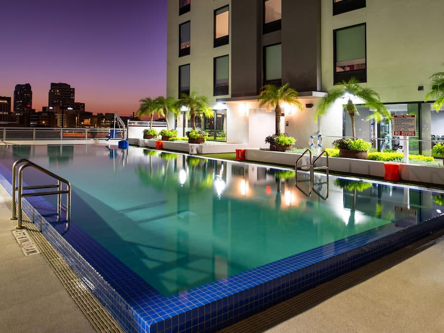 Outdoor pool, pool umbrellas, sun loungers