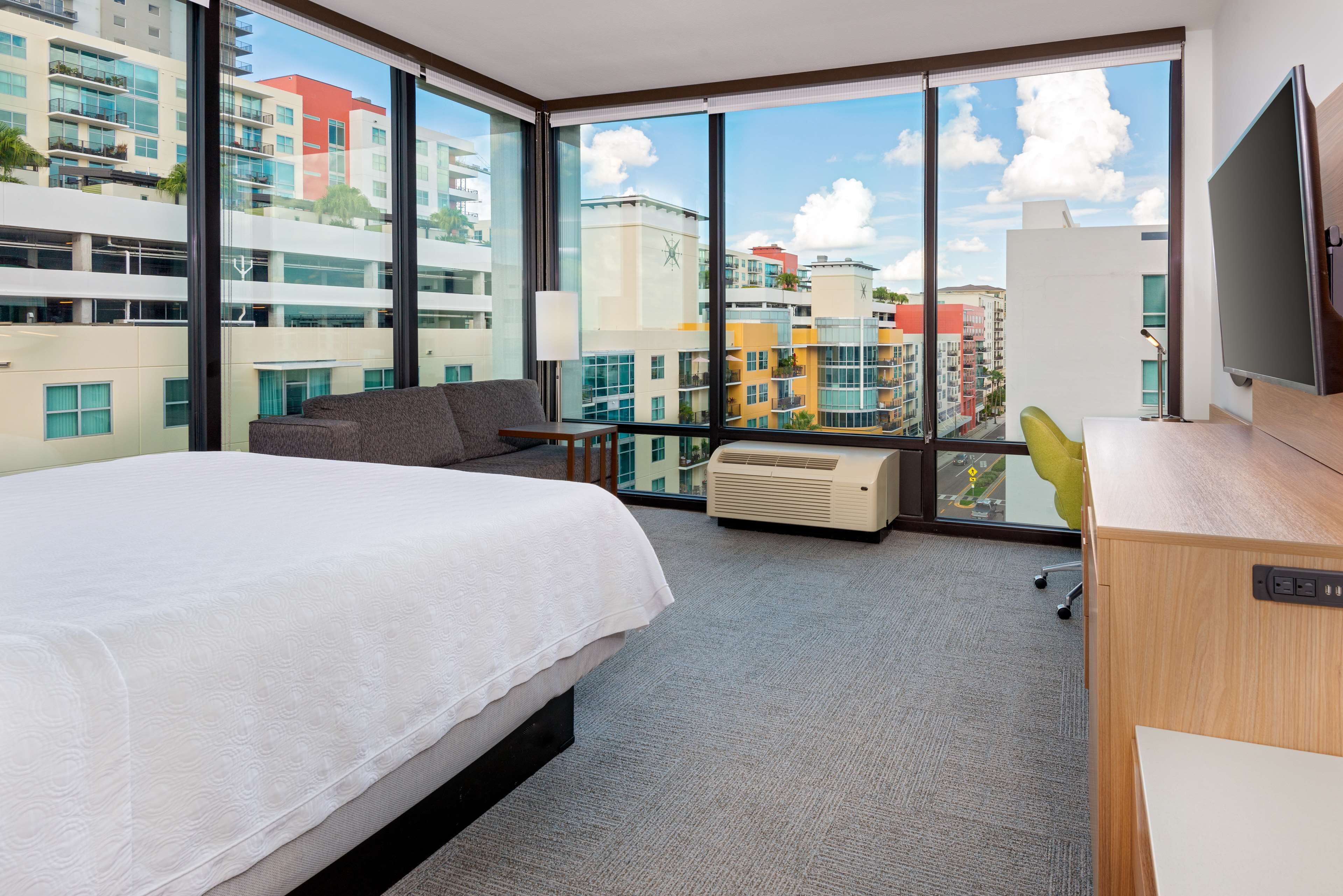 room, 1 king bed, refrigerator & microwave, corner | in-room safe, laptop workspace, blackout curtains, iron/ironing board