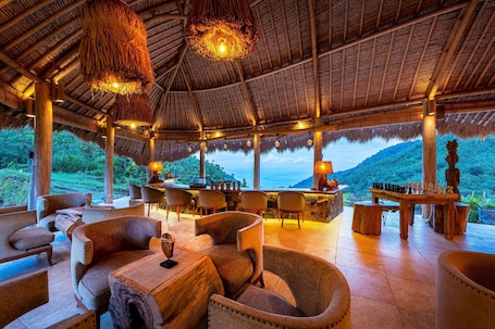 Breakfast, lunch, dinner served; Indonesian cuisine, pool views