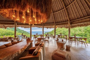 Breakfast, lunch, dinner served; Indonesian cuisine, pool views