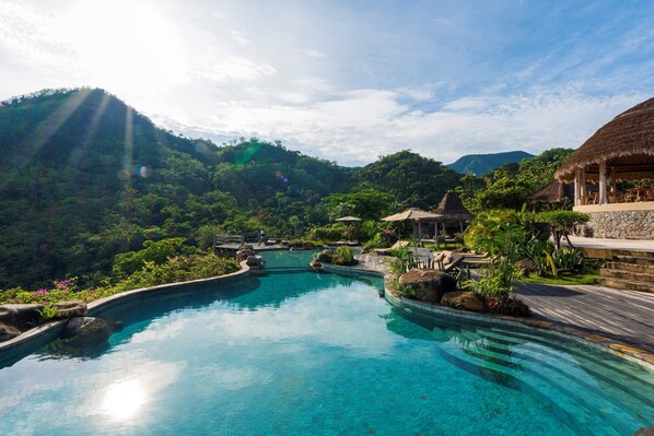 Outdoor pool, pool umbrellas, pool loungers