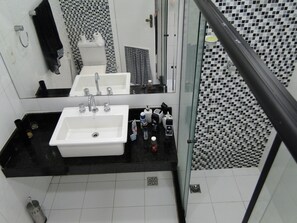 Shower, towels, soap, toilet paper