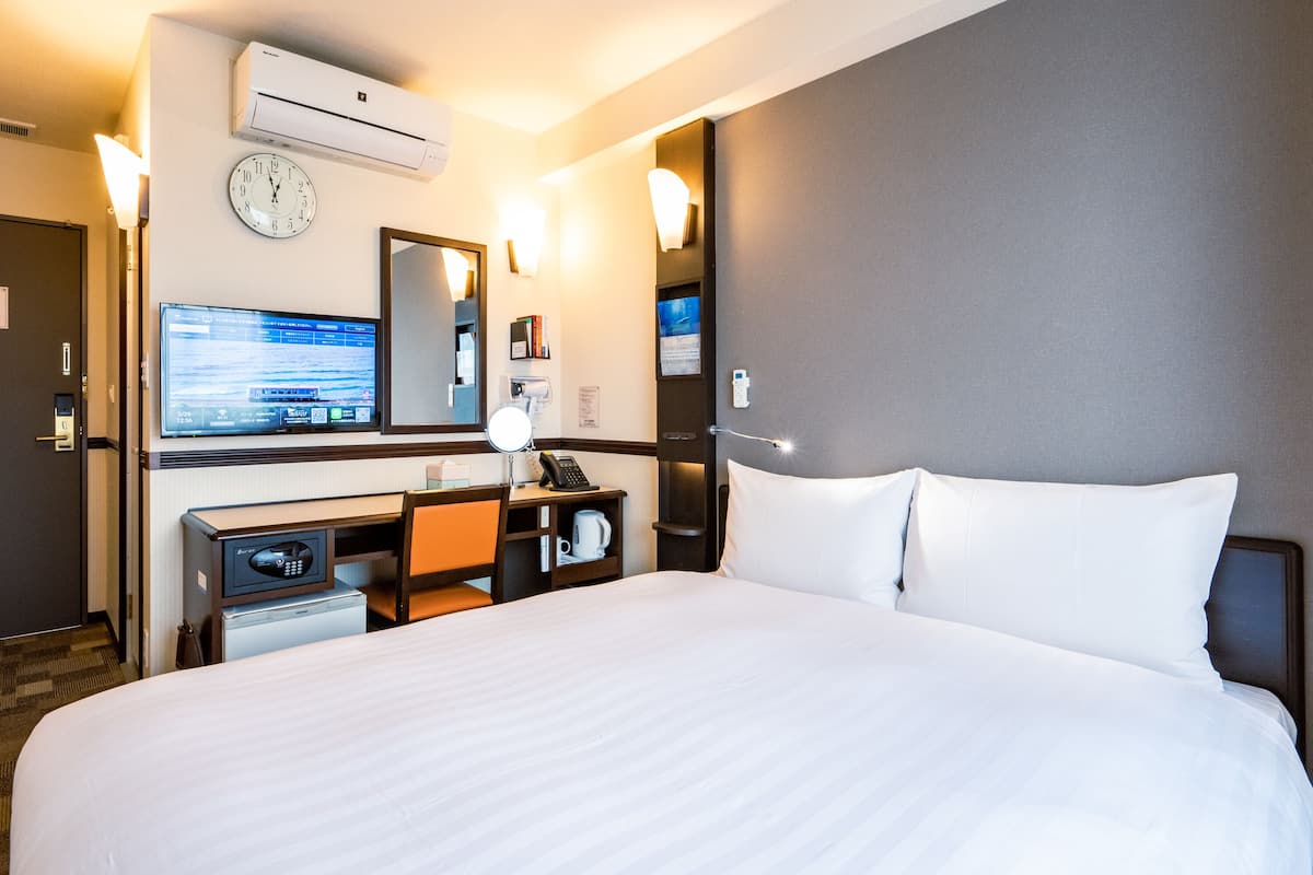 desk, laptop workspace, blackout curtains, iron/ironing board