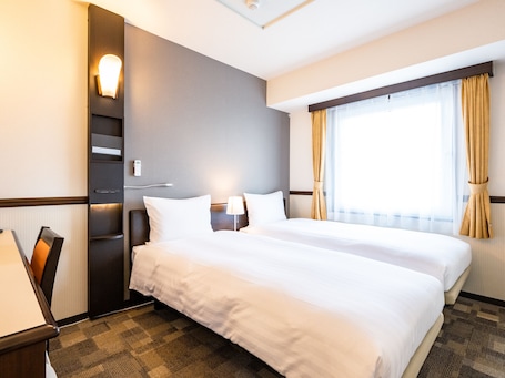 Desk, laptop workspace, blackout drapes, iron/ironing board. Toyoko Inn Chubu International Airport No.2