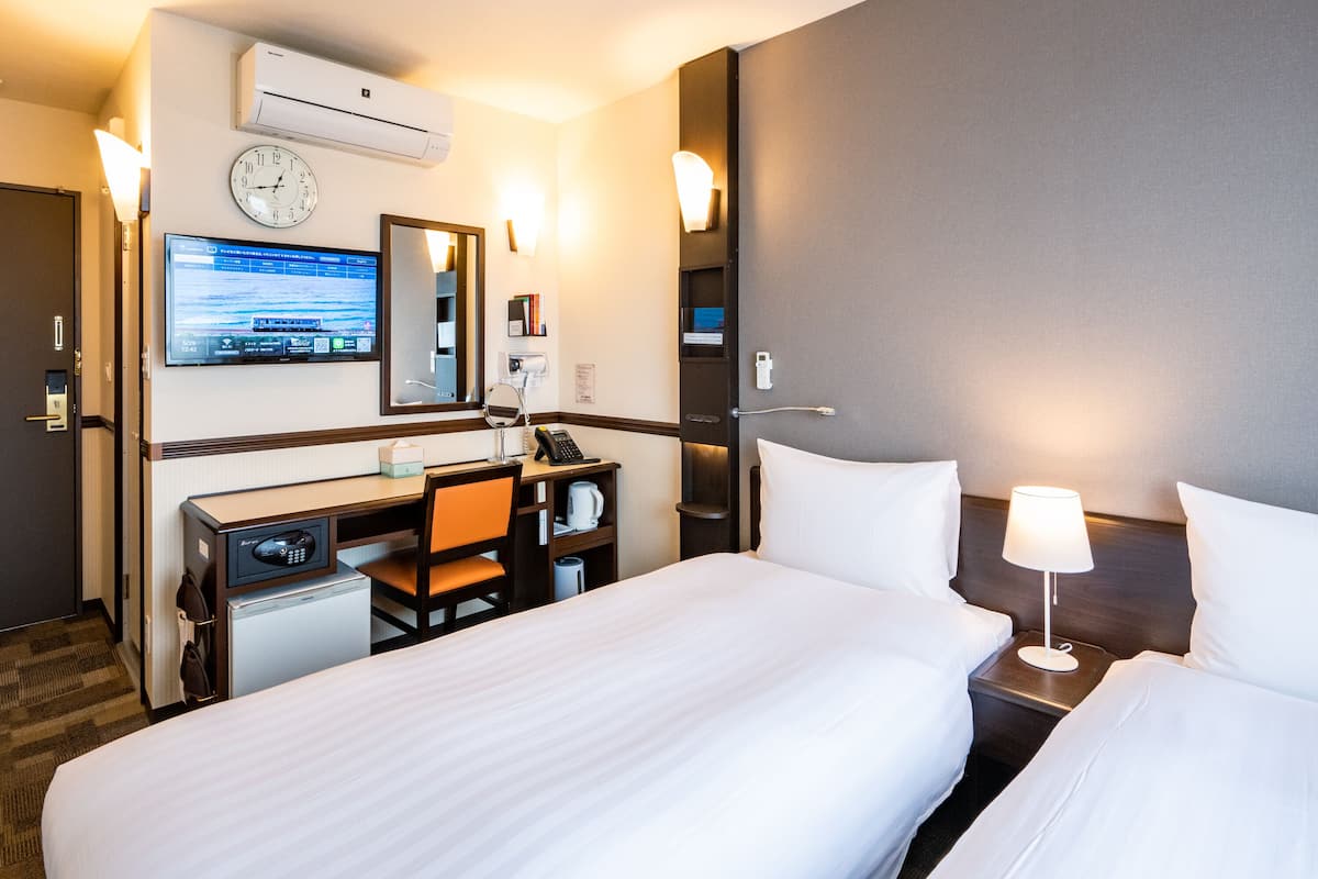 desk, laptop workspace, blackout curtains, iron/ironing board