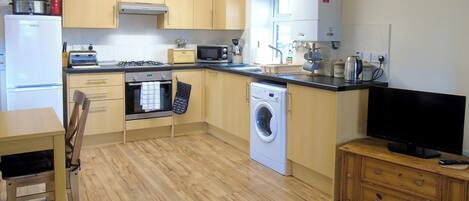 Astianpesukone, syöttötuoli