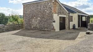 A stone building with a sign reading "The Old Dairy." - 2 bedroom accommodation in Thorncombe, near Broadwindsor (Thorncombe, near Broadwindsor)
