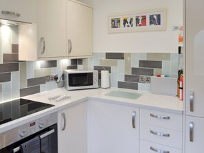 Dishwasher, high chair, cookware/dishes/utensils