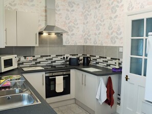 Dishwasher, high chair, cookware/dishes/utensils