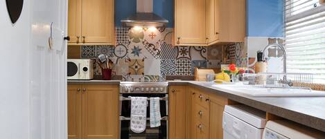 Dishwasher, high chair, cookware/dishes/utensils