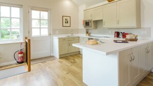 Dishwasher, high chair - 2 bedroom accommodation in Loddiswell Station, near Kingsbridge (Loddiswell Station, near Kingsbridge)