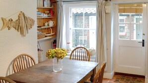 Dining - Boasting charm and character, this 3 storey cottage enjoys a cosy woodburner. (Blakeney)