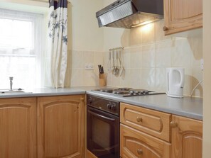 Fridge, microwave, cookware/dishes/utensils