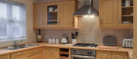 Dishwasher, highchair, cookware/dishes/utensils