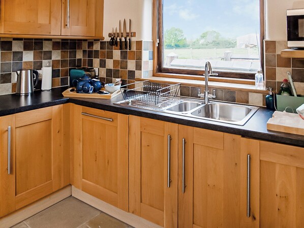 Dishwasher, highchair, cookware/dishes/utensils