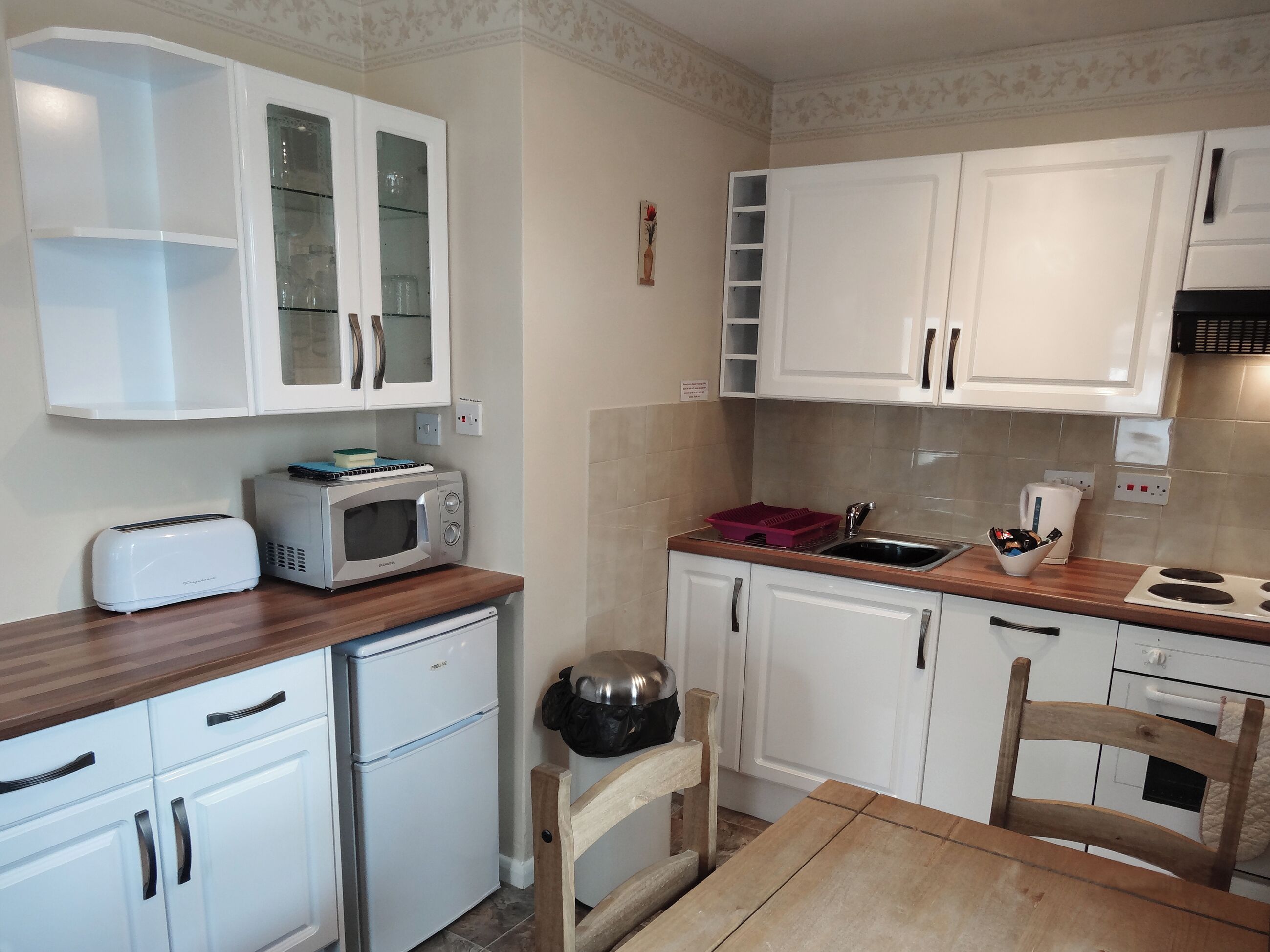 Dishwasher, highchair, cookware/dishes/utensils