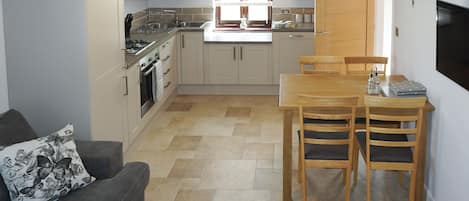Dishwasher, high chair, cookware/dishes/utensils