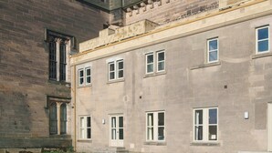 A historic building with multiple windows and a central entrance. - 2 bedroom accommodation in Brancepeth, near Durham (Brancepeth, near Durham)