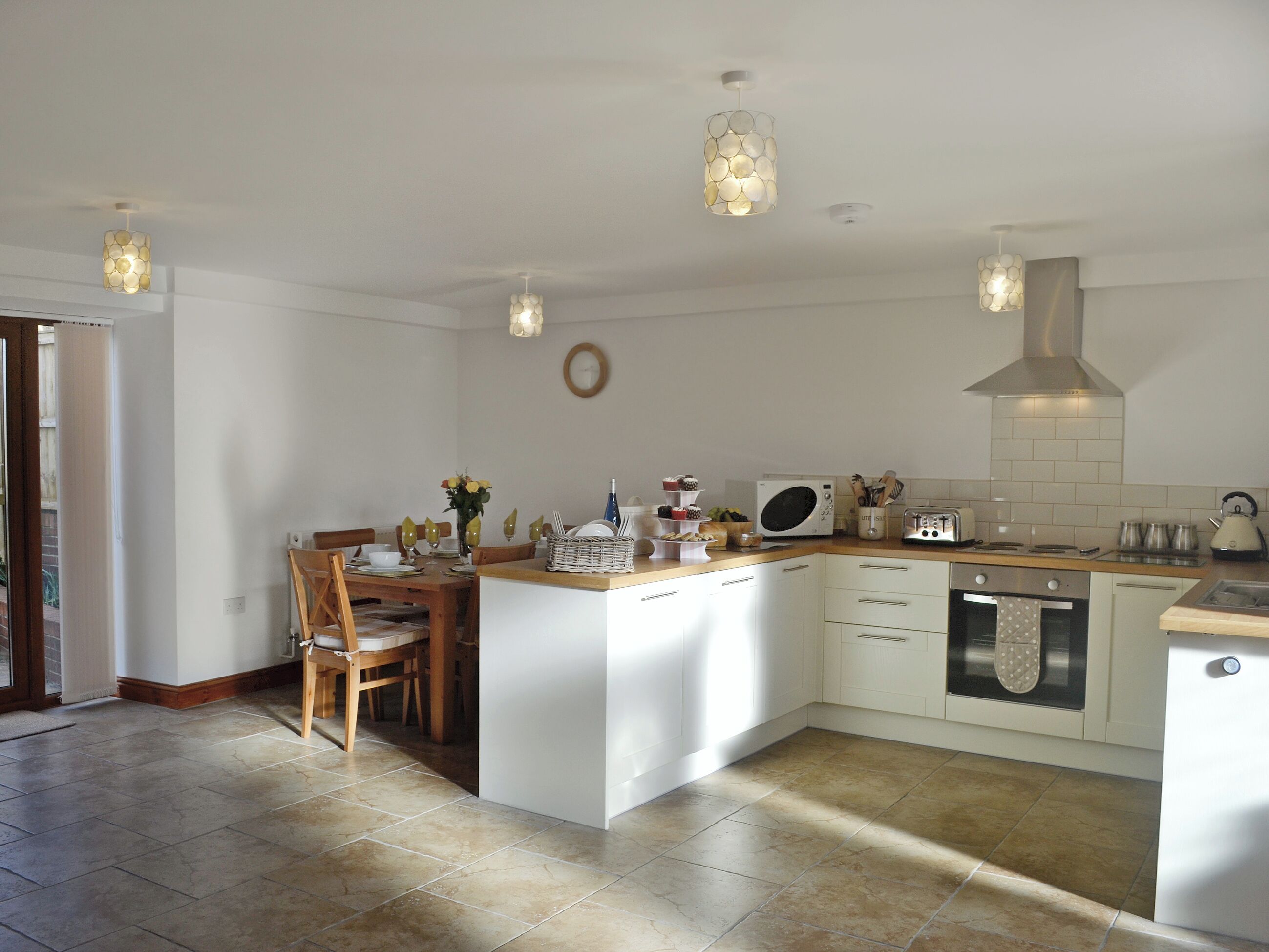 Dishwasher, high chair, cookware/dishes/utensils