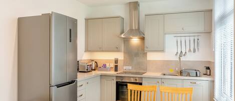 Highchair, cookware/dishes/utensils