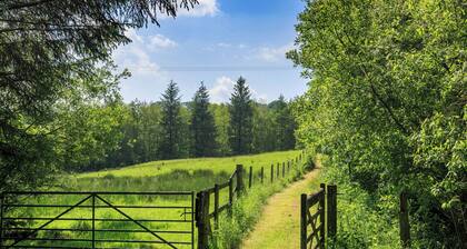 Boasting panoramic views, set in 15 acres, with open water lake and river.