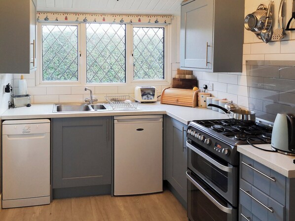 Dishwasher, highchair, cookware/dishes/utensils
