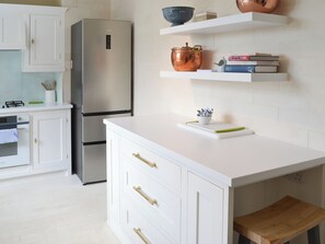 Dishwasher, high chair, cookware/dishes/utensils, freezer