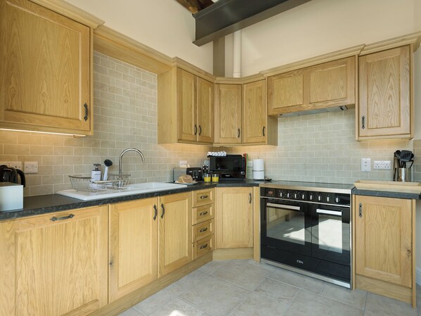Dishwasher, high chair, cookware/dishes/utensils