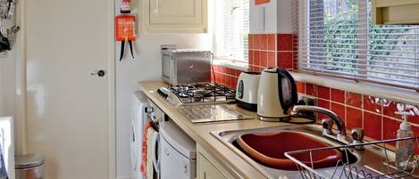 Highchair, cookware/dishes/utensils