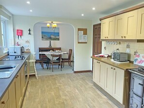 Highchair, cookware/dishes/utensils, freezer