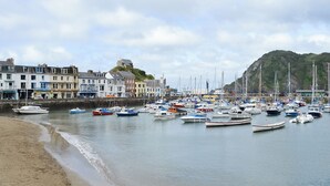 A harbor with numerous boats docked, a sandy beach, and buildings along the waterfront. - 2 bedroom accommodation in Chivenor Cross, near Barnstaple (Chivenor Cross, near Barnstaple)