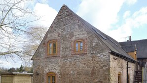 A stone building with three windows and a wooden door. - 1 bedroom accommodation in Six Ashes, near Bridgnorth (Six Ashes, near Bridgnorth)