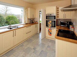Dishwasher, high chair, cookware/dishes/utensils - 4 bedroom accommodation in Gatehouse of Fleet, Kirkcudbright (Gatehouse of Fleet, Kirkcudbright)