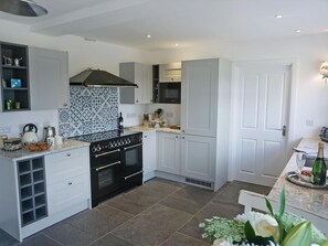 Dishwasher, high chair, cookware/dishes/utensils