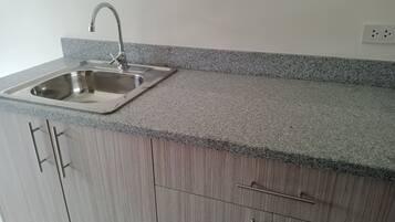 Fridge, oven, electric kettle, toaster