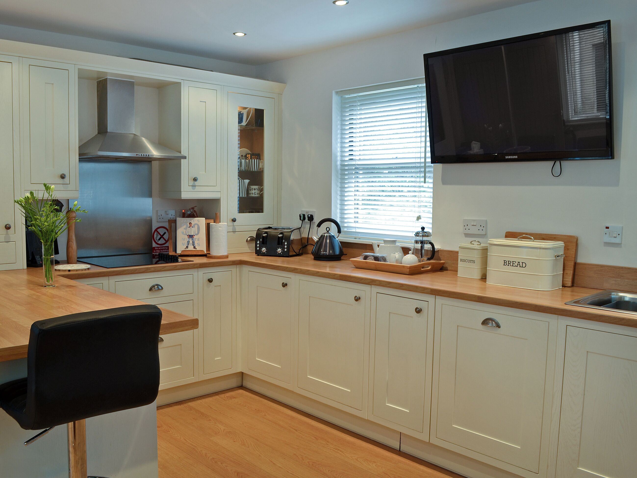 Dishwasher, high chair, cookware/dishes/utensils