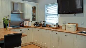 Dishwasher, highchair, cookware/dishes/utensils