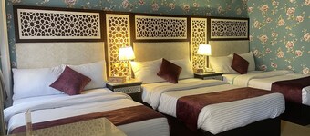 PRIVATE QUADRUPLE ROOM. TOWN VIEW