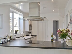 Dishwasher, high chair, cookware/dishes/utensils, freezer - 4 bedroom accommodation in Craster near Alnwick (Craster near Alnwick)