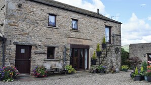 A stone building with a sign reading "The Old Goat House." - 3 bedroom accommodation in Thornton Rust, near Leyburn (Thornton Rust, near Leyburn)