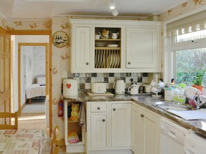 Dishwasher, cookware/dishes/utensils, freezer - 2 bedroom accommodation in Graigfechan, near Ruthin (Graigfechan, near Ruthin)
